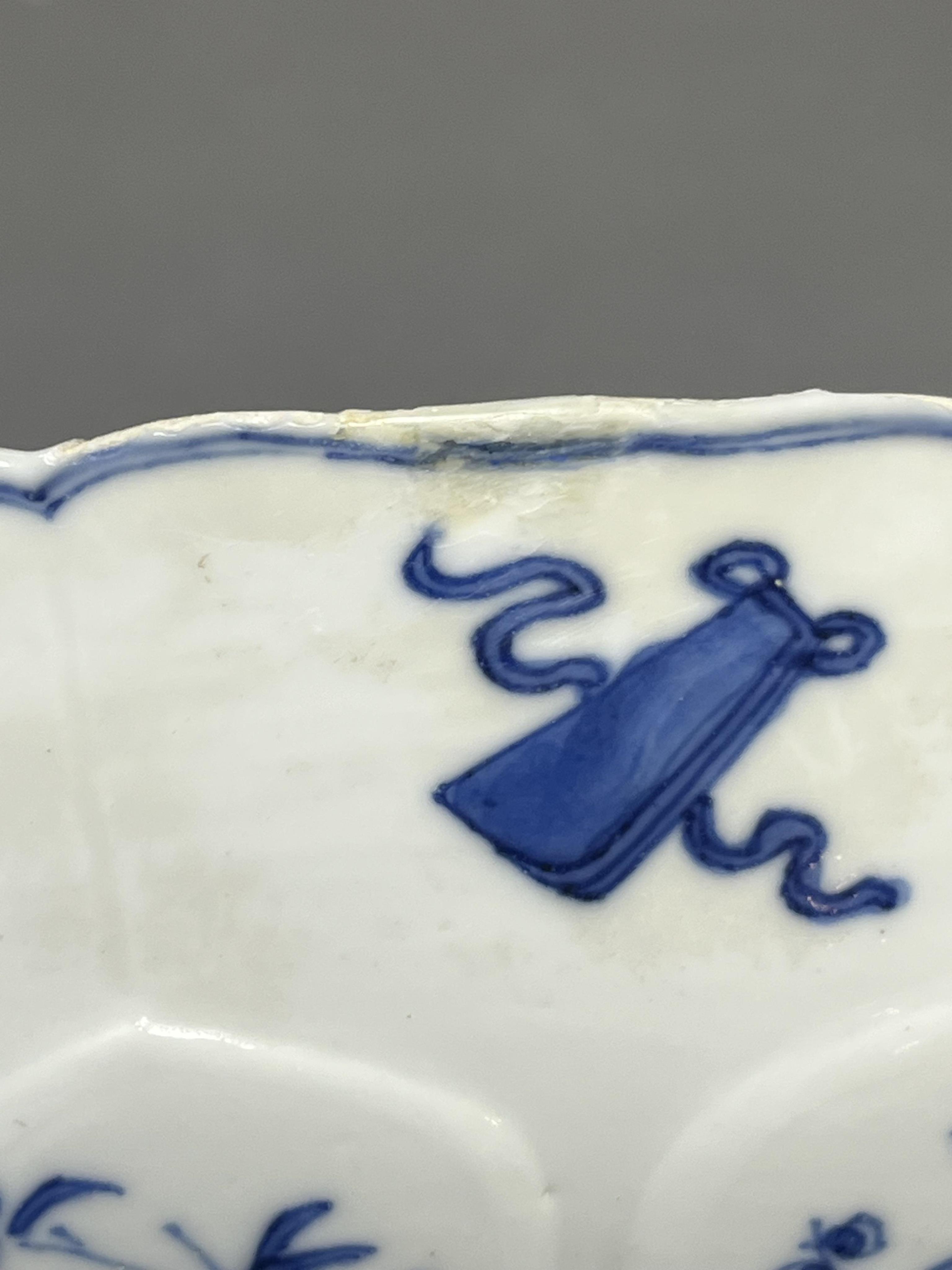 A Chinese blue and white ‘ladies and phoenix’ dish, Kangxi period